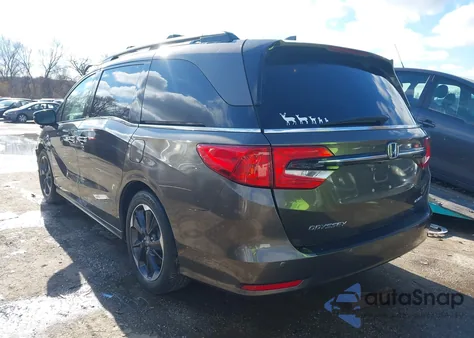 2021 Honda Odyssey Elite z USA, uszkodzony, nr VIN 5FNRL6H98MB010450